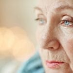 Close-up of face of senior woman looking away