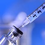 Syringe Being Inserted into a Vial