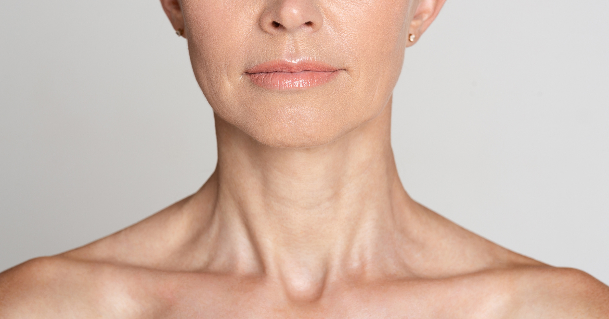 Skin care. Half face portrait of mature woman Wrinkles