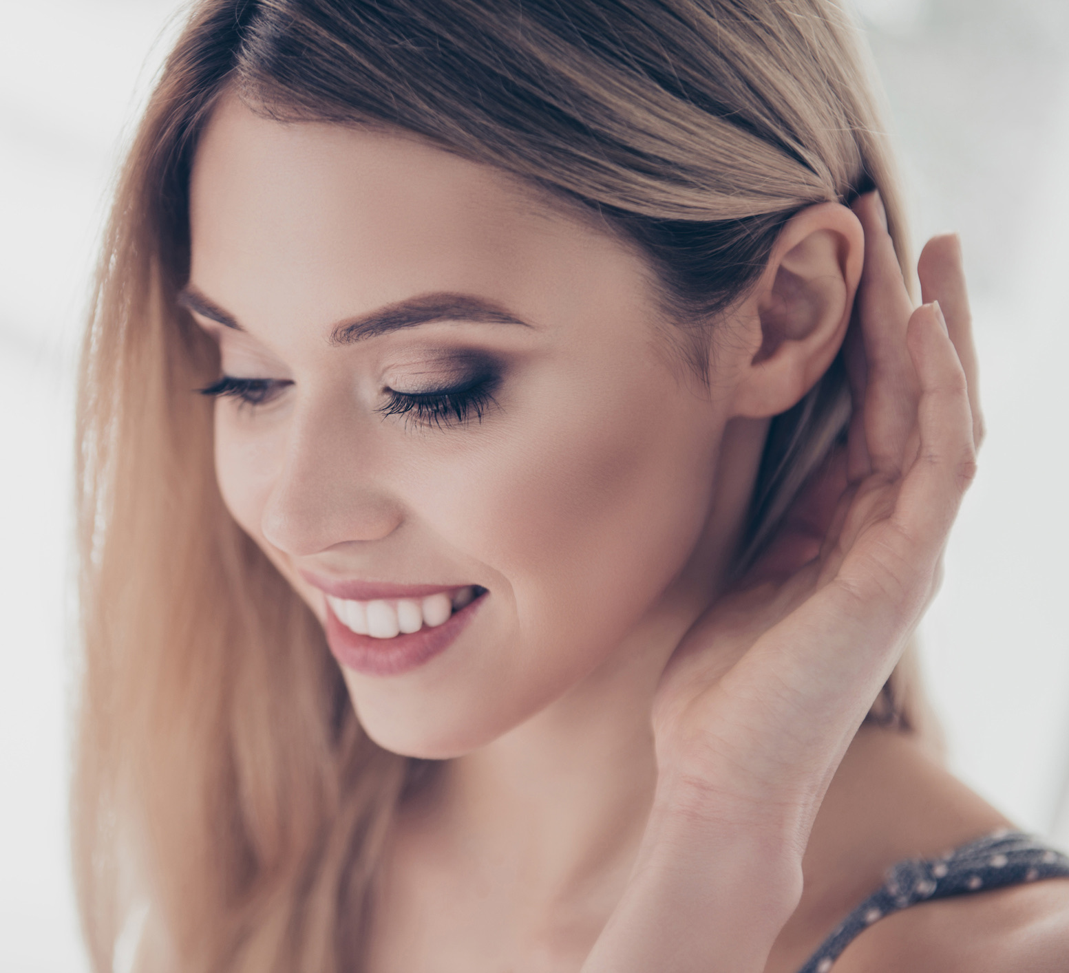Close up portrait of successful, pretty, charming, gorgeous, cheerful, cute, modern, naked, nude, natural, positive, correcting her hair behind ear, skincare, bodycare, healthcare concept Yearly Skin Check